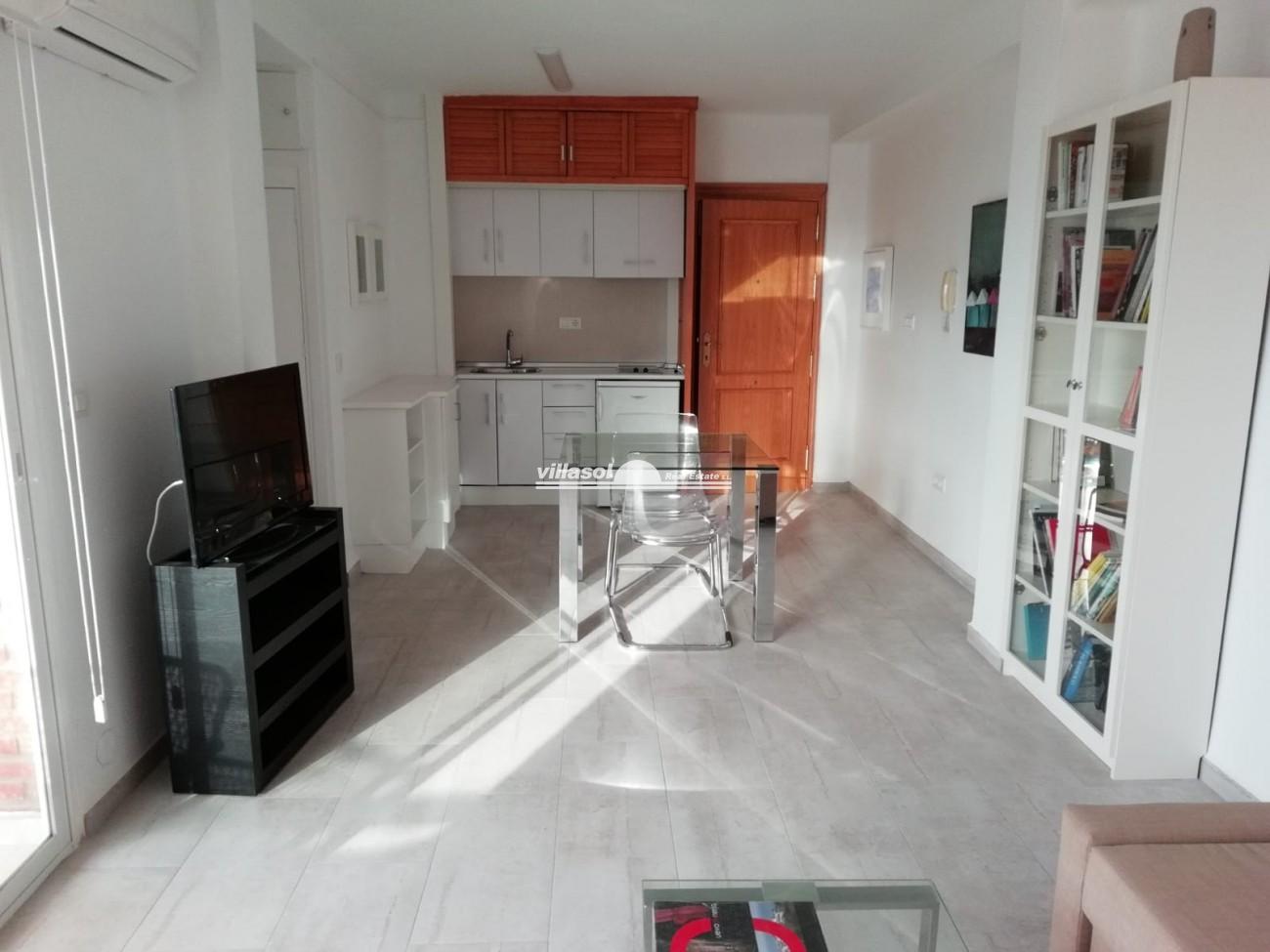 A renovated and delightful light studio apartment for sale in Torrox Costa with nice views